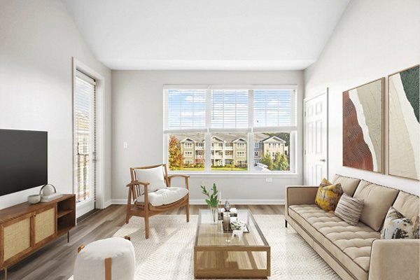 Spacious living room with modern decor at The Prescott at Concord Apartments