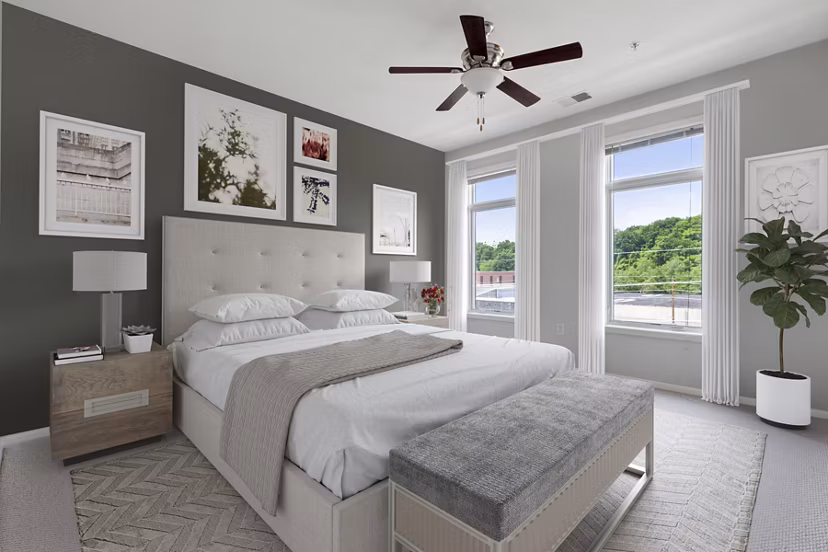 Spacious bedroom with modern furnishings at 1000 Jefferson Street Apartments in Greystar luxury community