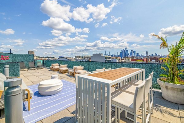 Spacious patio with city views at 1000 Jefferson Street Apartments