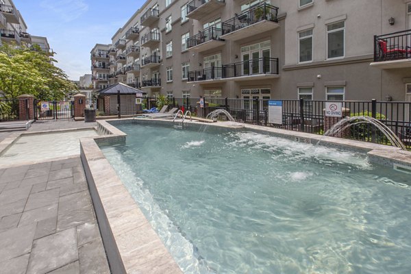 Rooftop pool with skyline views at 1000 Jefferson Street Apartments