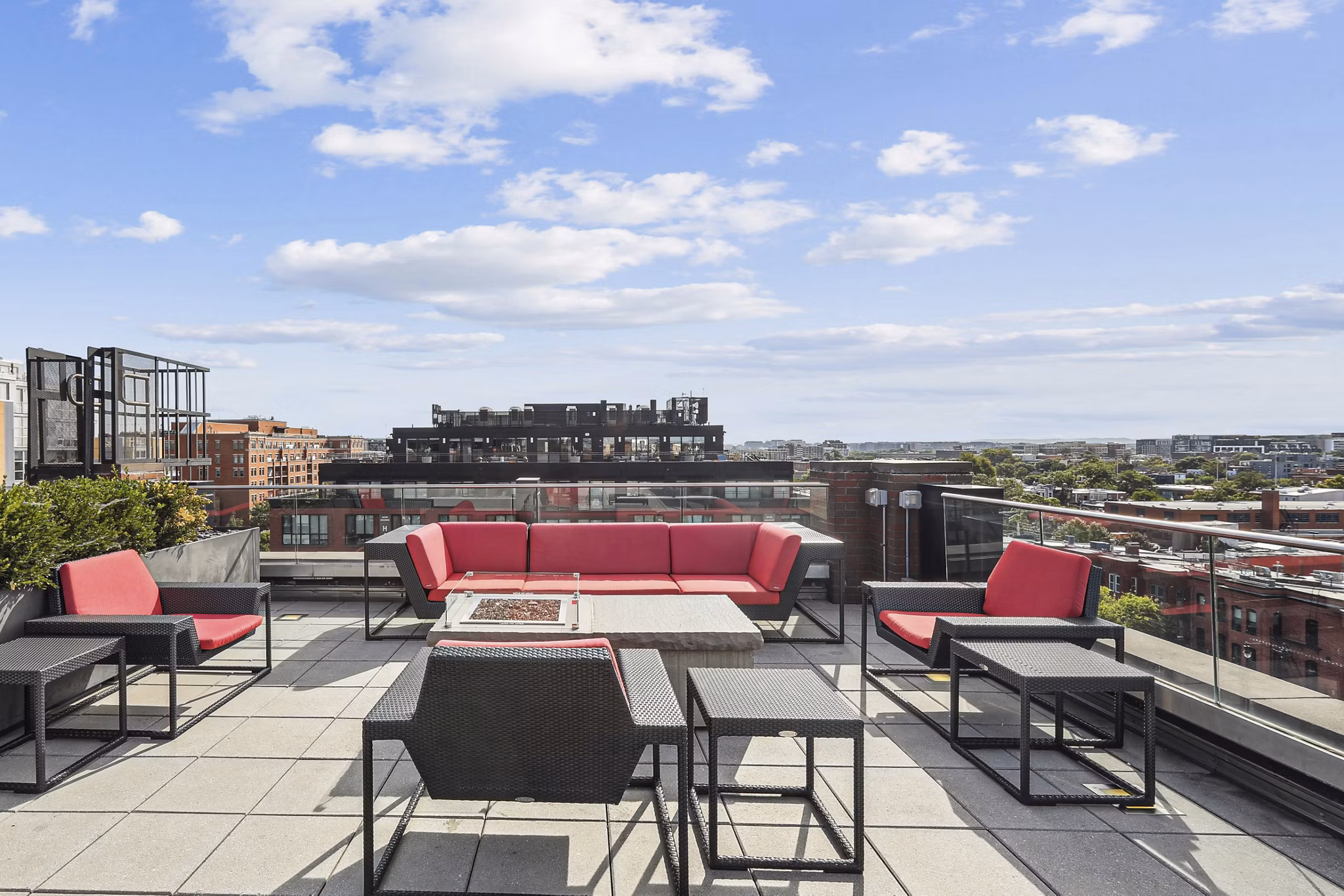 Business center with modern workstations at The Louis Apartments