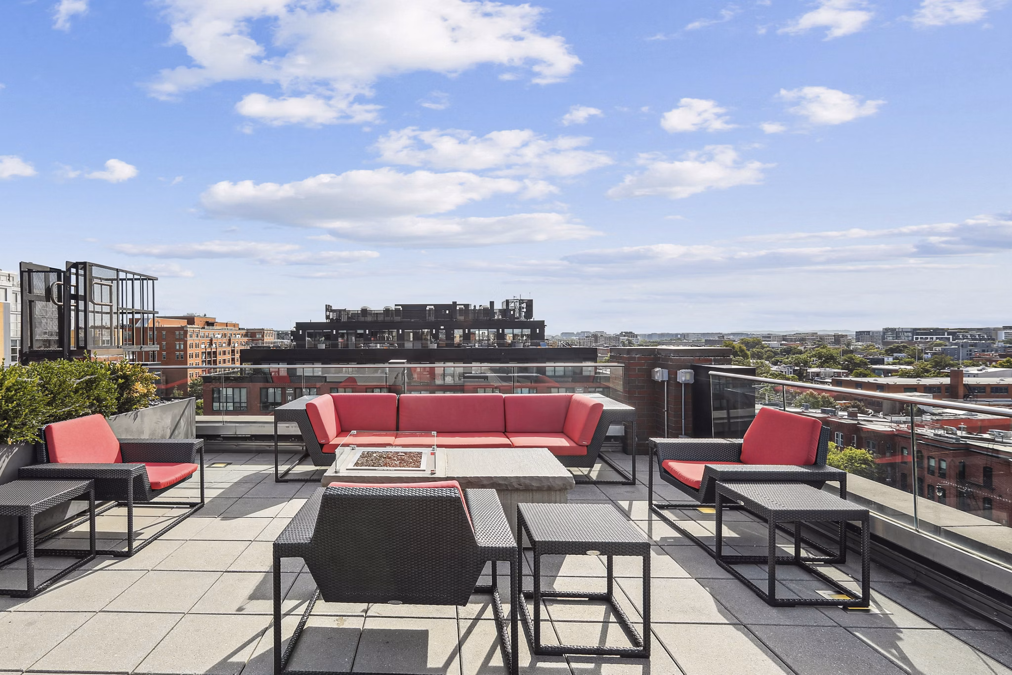 Business center with modern workstations at The Louis Apartments