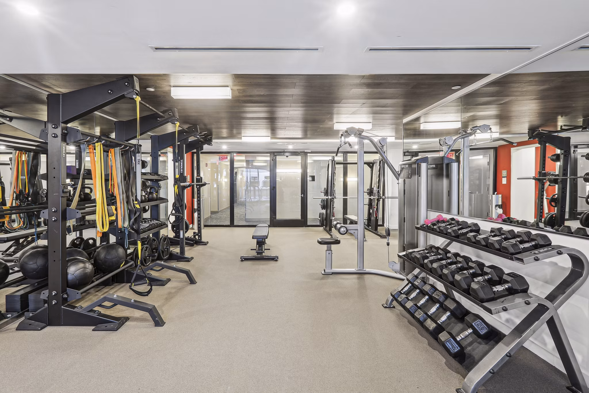 Modern fitness center with state-of-the-art equipment at The Louis Apartments