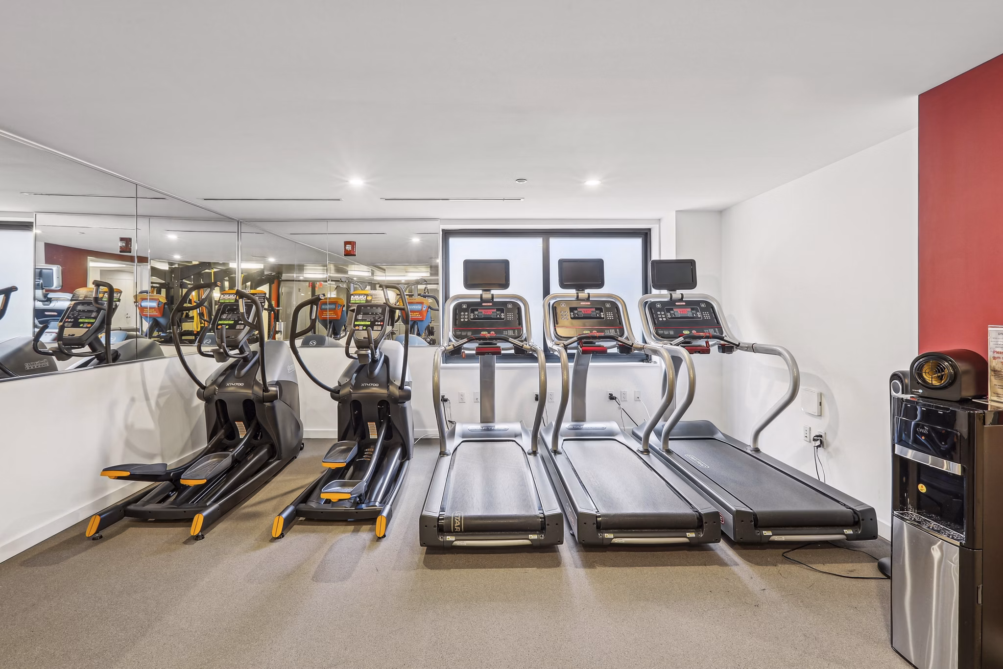 fitness center at Louis at 14th Apartments 