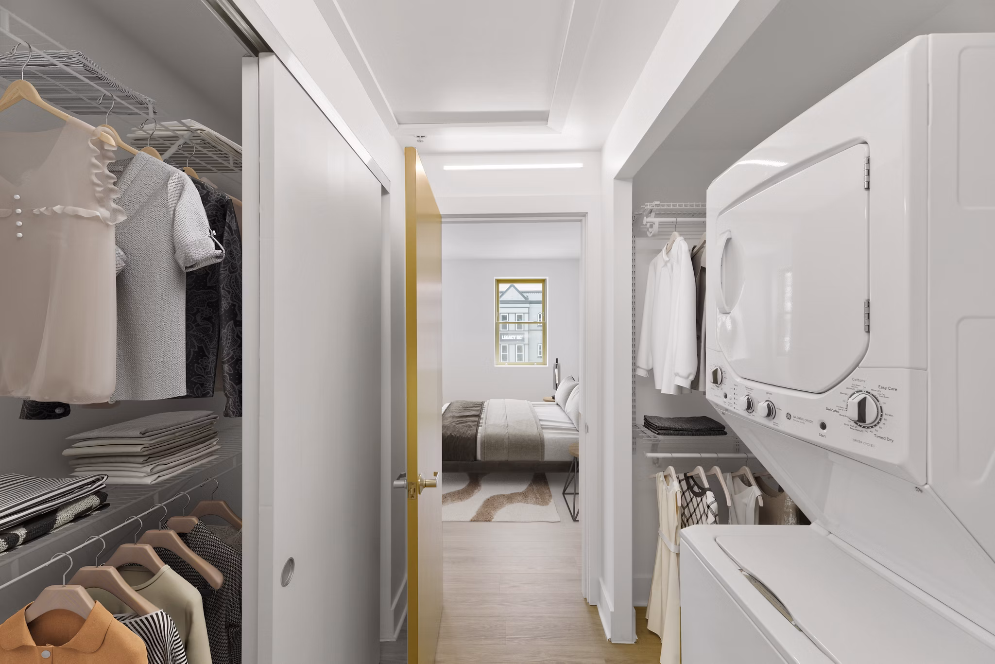 Bedroom closet and laundry room with ample storage at Louis at 14th Apartments