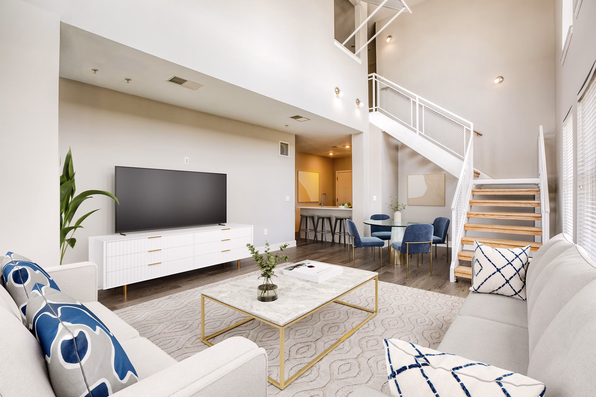 Cozy living room with contemporary decor at Upstairs at Bethesda Row Apartments