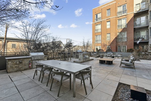 grill area at Upstairs at Bethesda Row Apartments