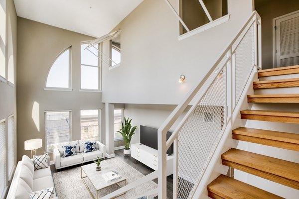 Spacious kitchen with modern appliances at Upstairs at Bethesda Row Apartments