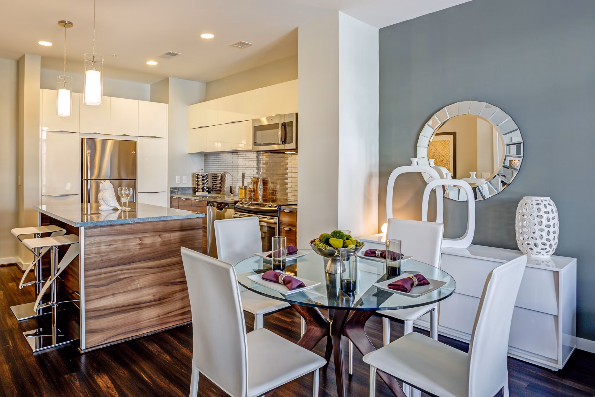 Dining room featuring modern decor and elegant lighting at PerSei at Pike & Rose Apartments