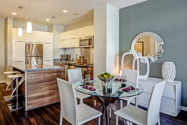 Dining room featuring modern decor and elegant lighting at PerSei at Pike & Rose Apartments