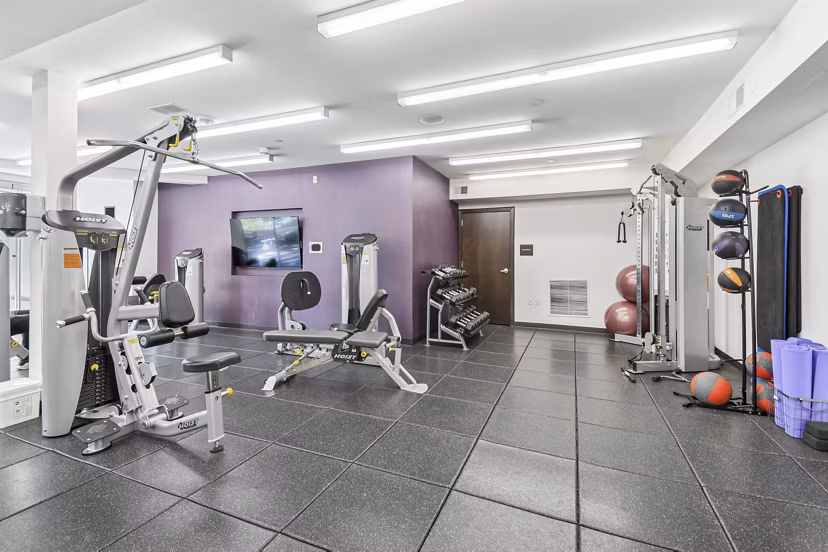 State-of-the-art fitness center with modern equipment at PerSei at Pike & Rose Apartments