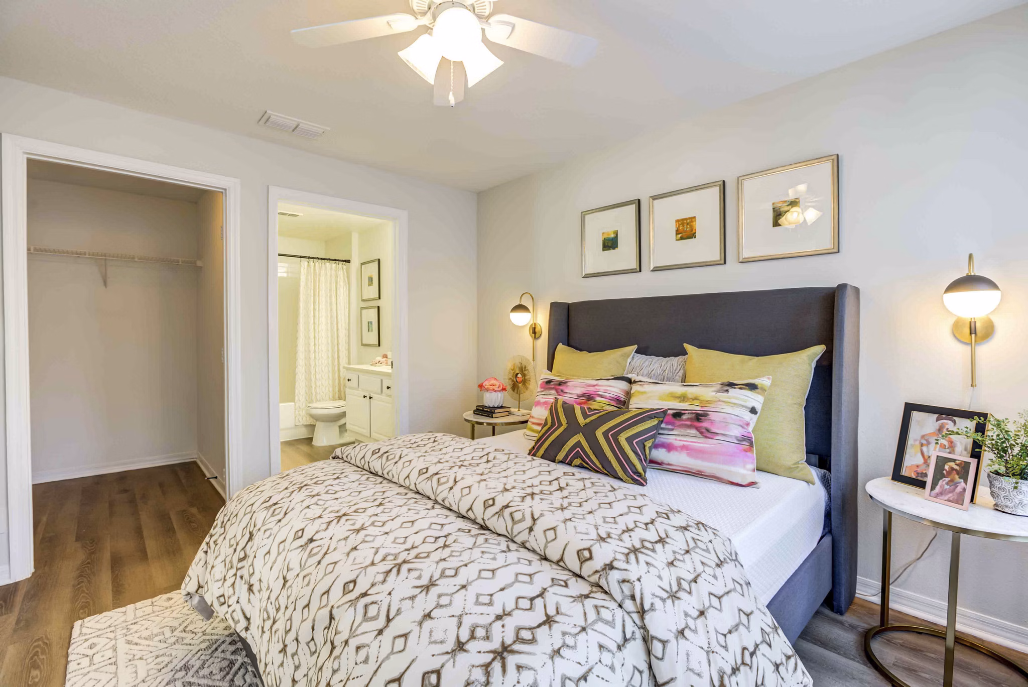 Comfortable bedroom with stylish decor at Parks at Hunter's Creek Apartments