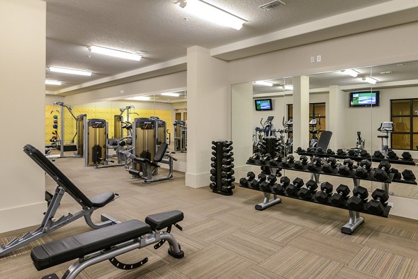 fitness center at Urbana Apartments