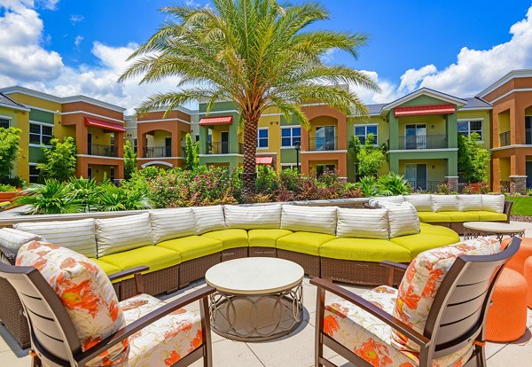 Chic patio with modern furniture at Urbana Apartments, a premier Greystar luxury community