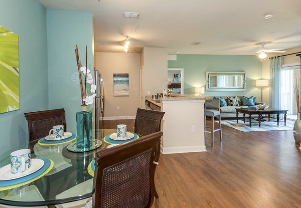 Dining area with modern fixtures and elegant dÃ©cor at Town Center at Lakeside Village Apartments