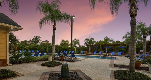 Courtyard with lush landscaping at Town Center at Lakeside Village Apartments providing a serene outdoor retreat