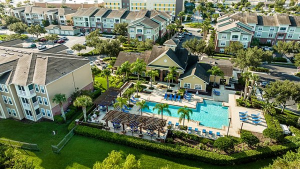 Scenic view at Town Center at Lakeside Village Apartments featuring waterfront and lush landscaping