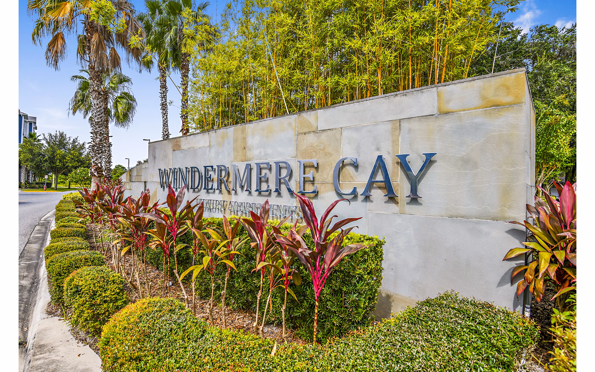 Windermere Cay Apartments: Entrance signage for luxury living in serene community