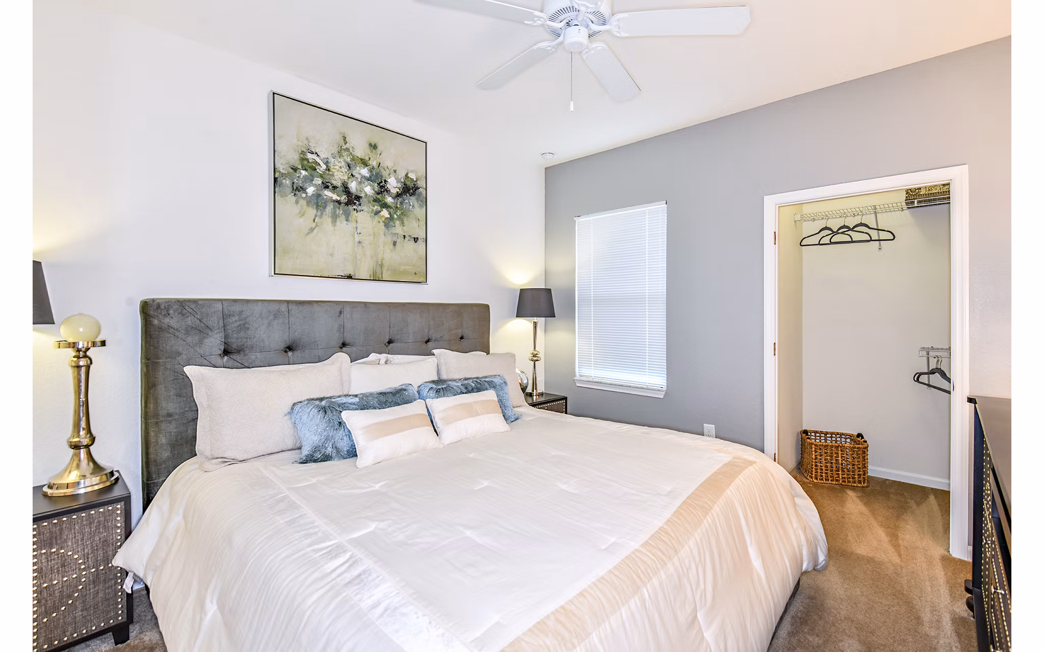 Cozy bedroom with modern decor at Windermere Cay Apartments