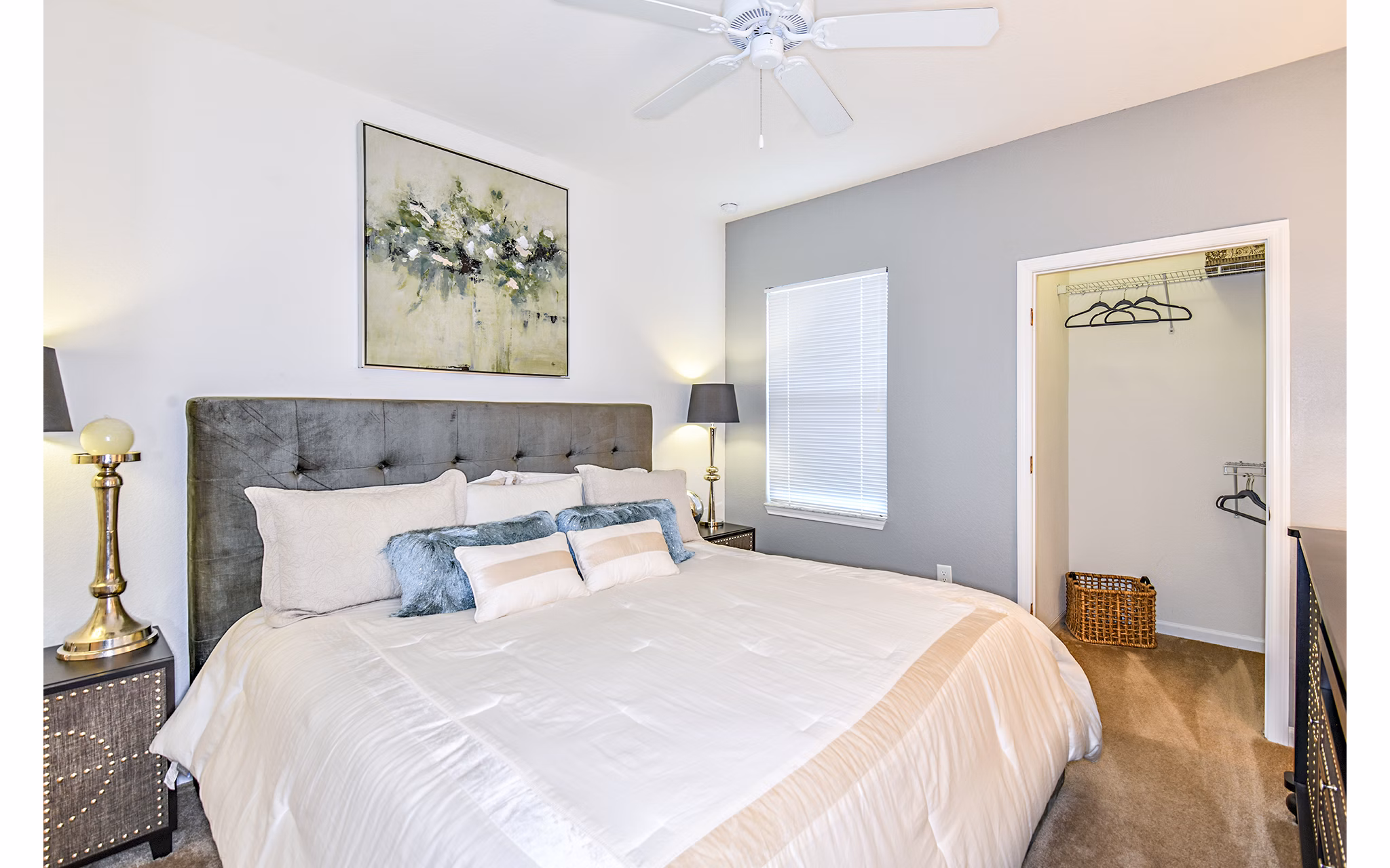 Cozy bedroom with modern decor at Windermere Cay Apartments