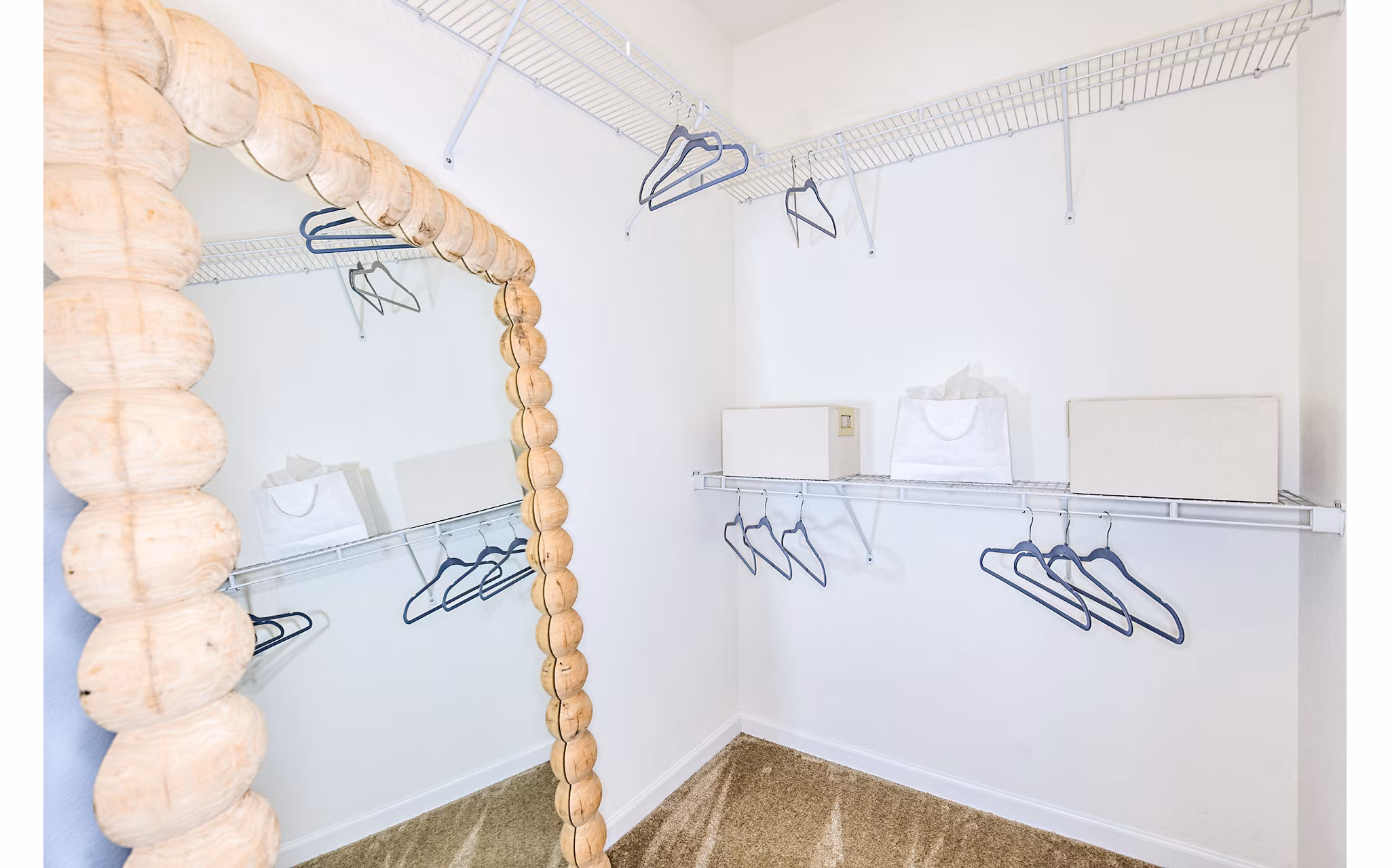Spacious bedroom closet with ample storage at Windermere Cay Apartments in a luxury Greystar community