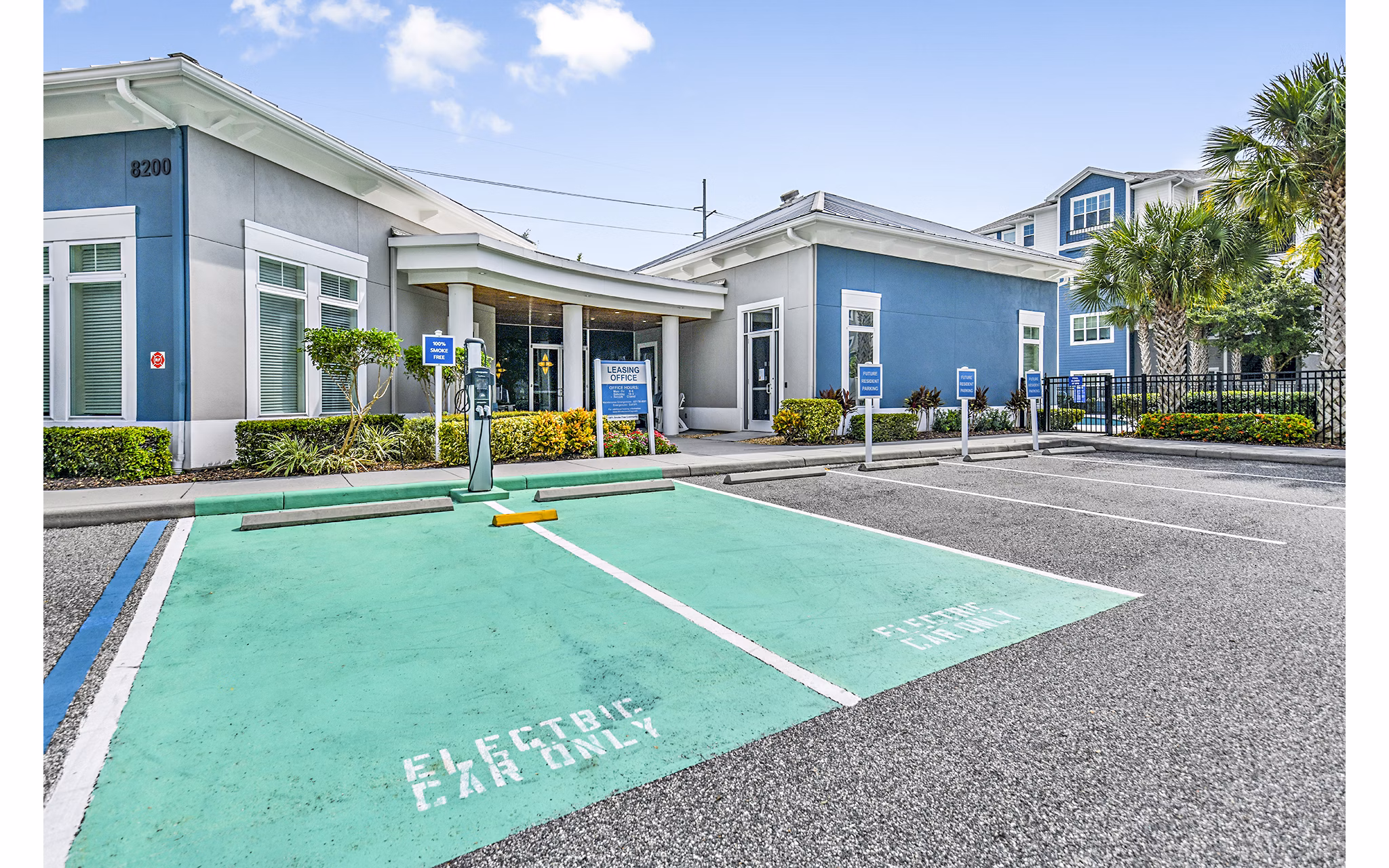 Clubhouse with car charging station at Windermere Cay Apartments, offering convenience and modern amenities for residents