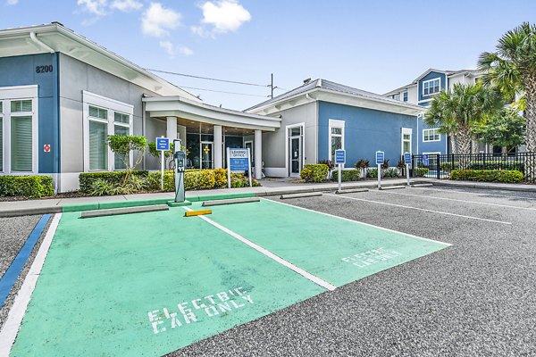 Clubhouse with car charging station at Windermere Cay Apartments, offering convenience and modern amenities for residents
