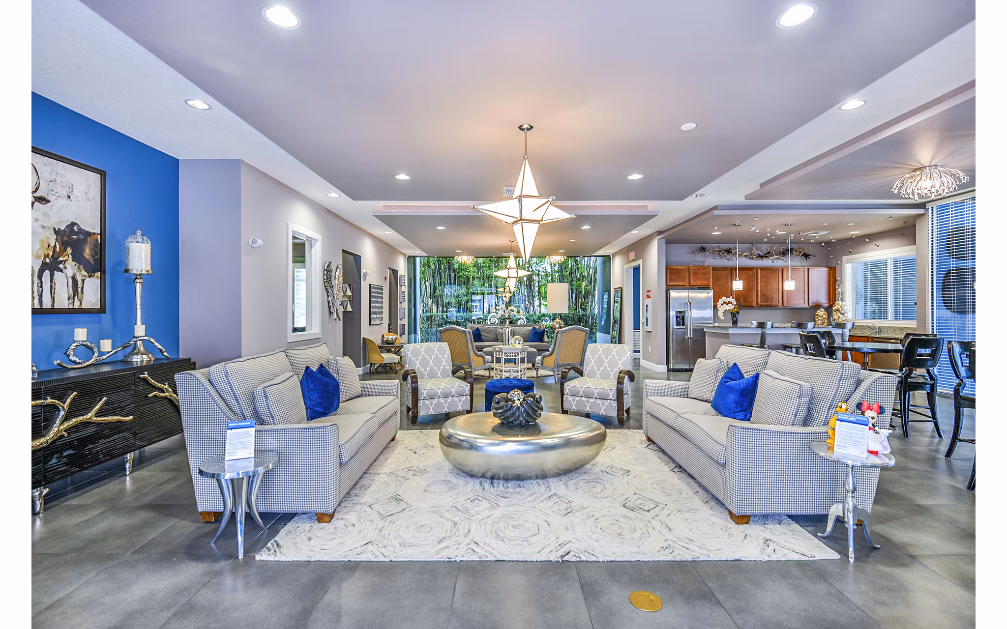 Elegant clubhouse with modern furnishings at Windermere Cay Apartments, ideal for social gatherings and community events