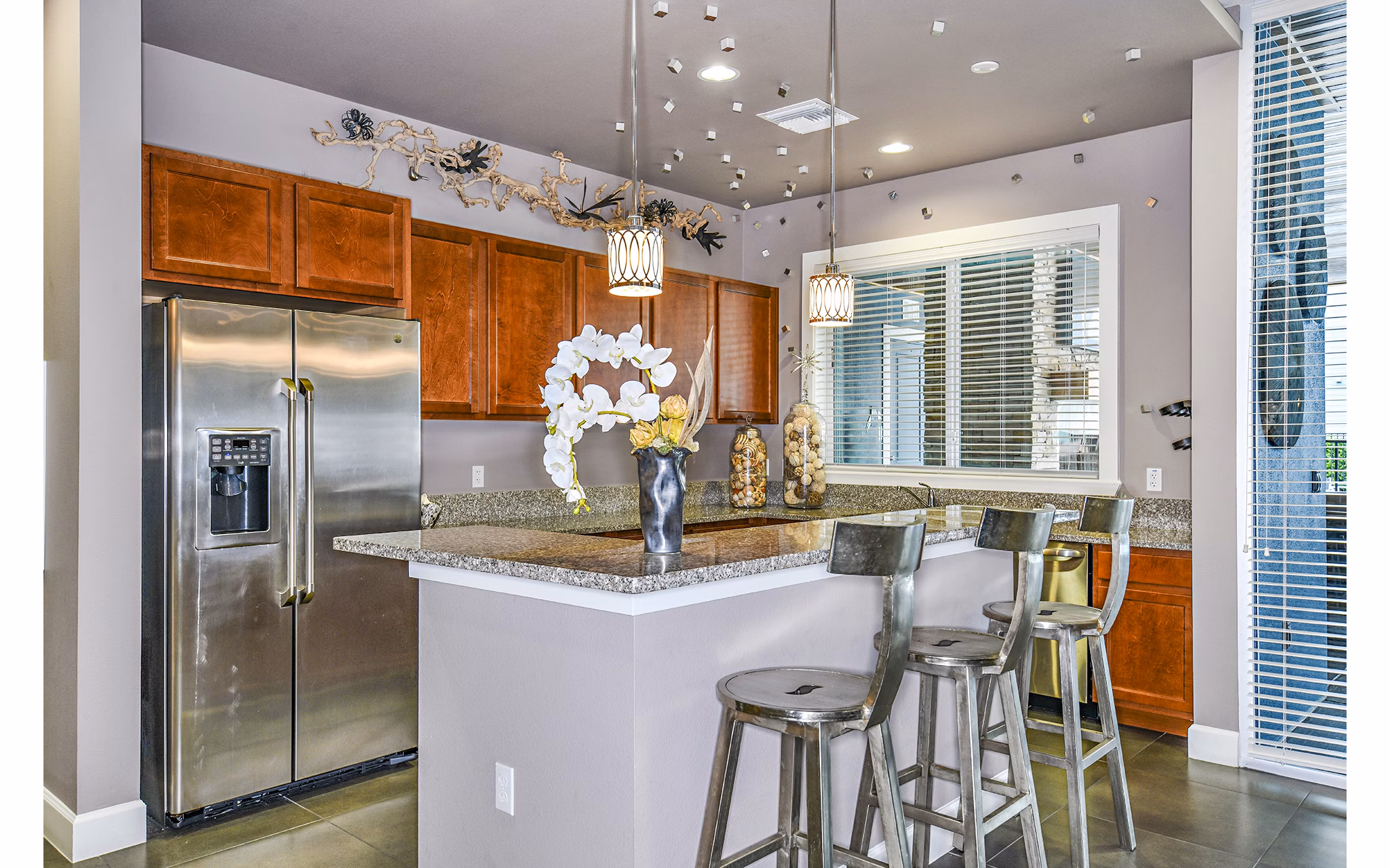 Clubhouse with modern design and comfortable seating at Windermere Cay Apartments, a luxury Greystar community in Winter Garden