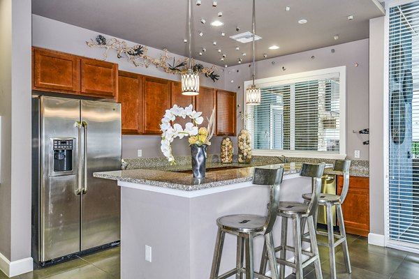 Clubhouse with modern design and comfortable seating at Windermere Cay Apartments, a luxury Greystar community in Winter Garden