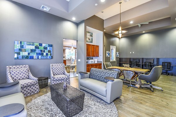 Business center with modern computer stations at Windermere Cay Apartments
