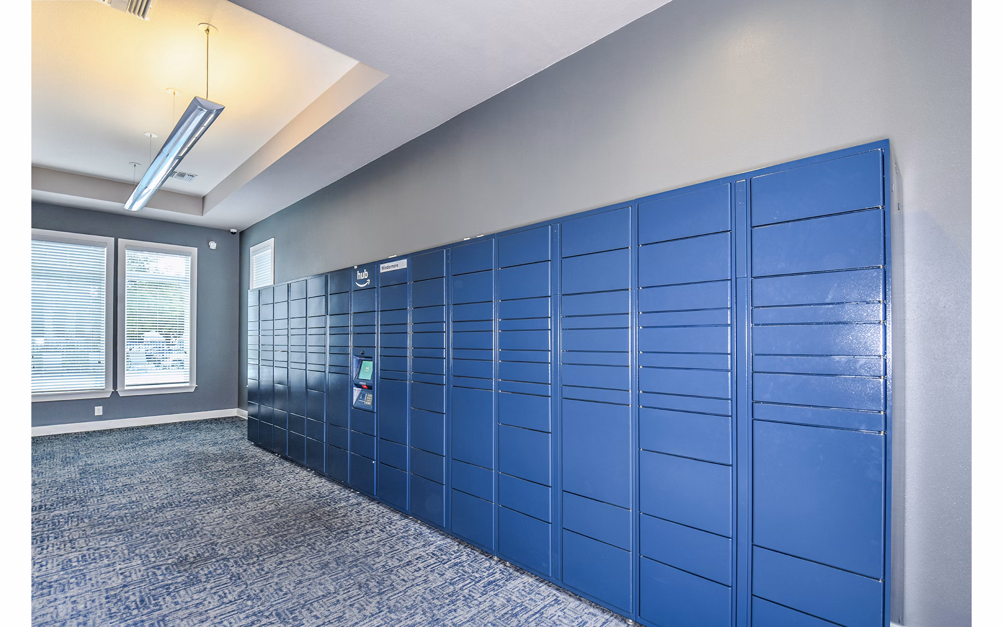 Parcel pickup lockers at Windermere Cay Apartments in Orlando, convenient package handling for residents