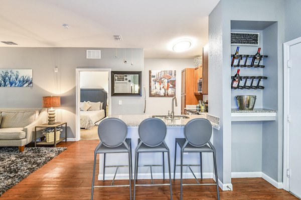 Modern kitchen with stainless steel appliances at Windermere Cay Apartments