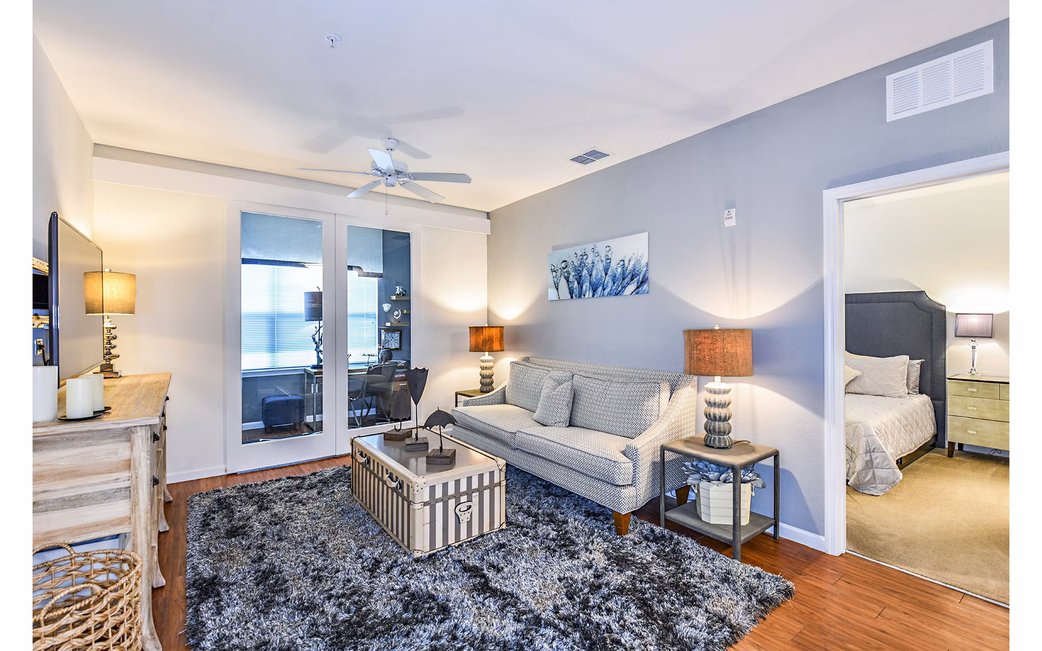 Spacious living room with modern furnishings in Windermere Cay Apartments
