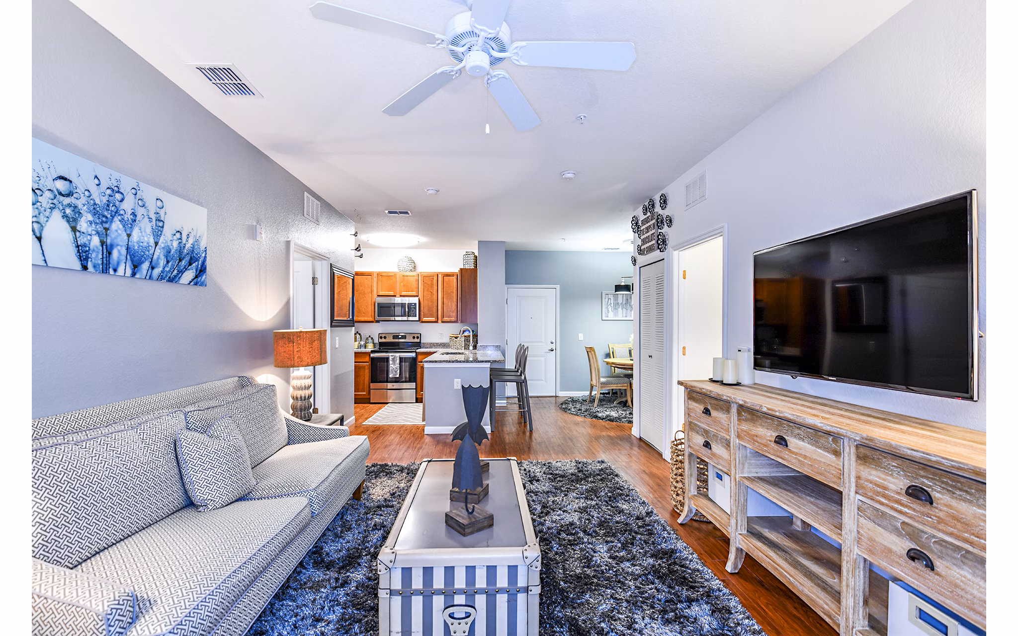 Cozy living room with modern decor and a spacious layout in Windermere Cay Apartments
