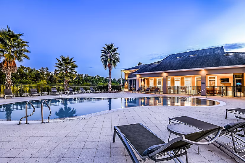 Pool with sun loungers at Windermere Cay Apartments Luxury apartments
