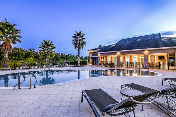 Pool with sun loungers at Windermere Cay Apartments Luxury apartments