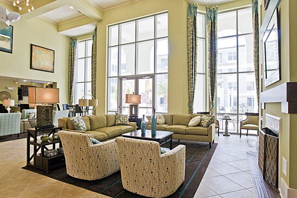 Modern clubhouse with stylish lounge seating at Aqua at Millenia Apartments