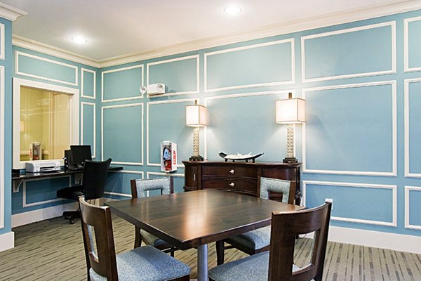 Aqua at Millenia: Stylish clubhouse featuring modern decor and seating areas
