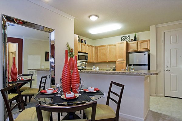 Elegant dining room with modern furniture at Aqua at Millenia Apartments