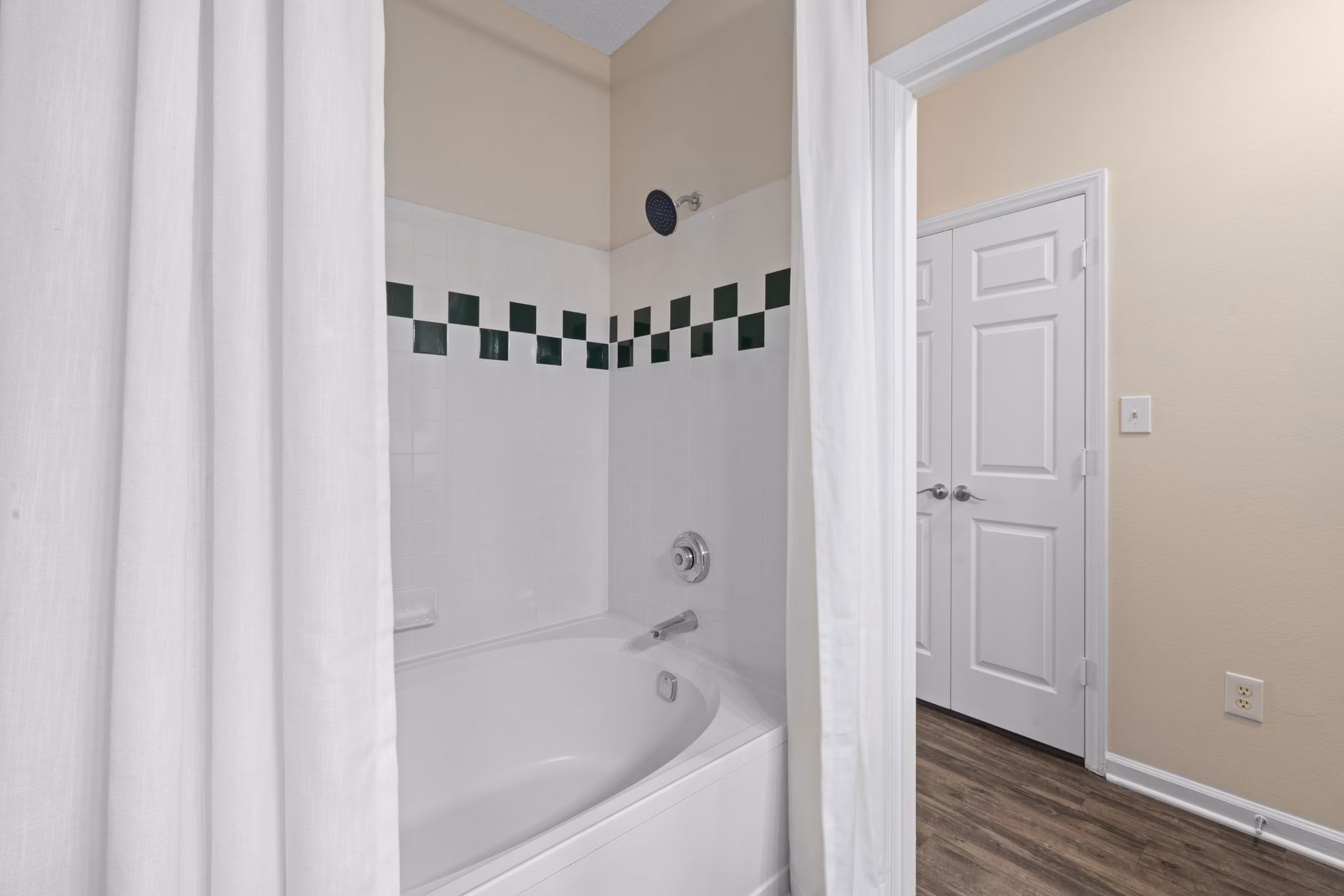 The Morgan at Chapel Hill Apartments: Contemporary bathroom with sleek fixtures and ample storage space