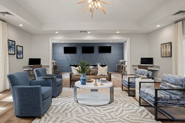 Game room with pool table and lounge seating at The Morgan at Chapel Hill Apartments