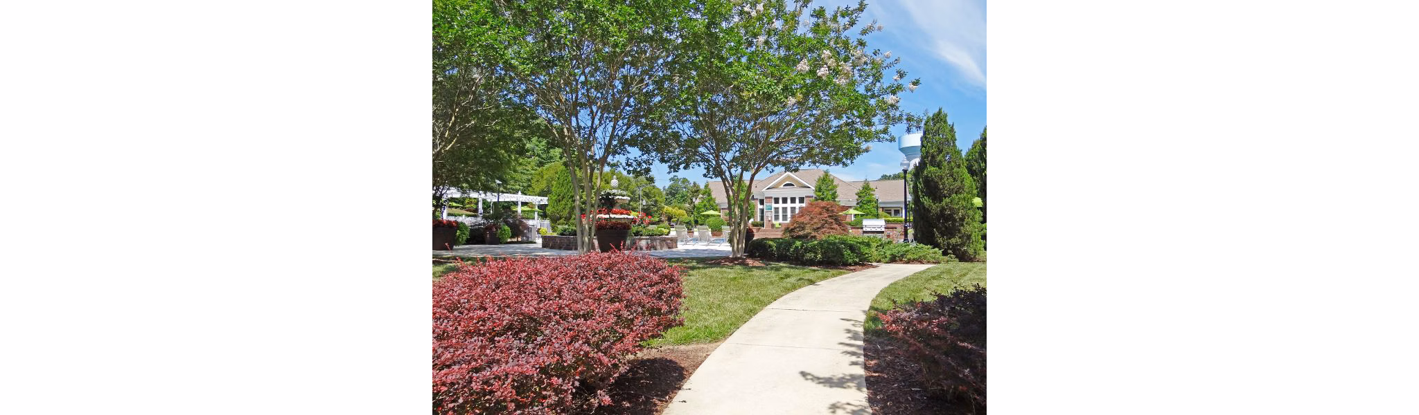 Courtyard featuring lush landscaping at Wakefield Glen Apartments