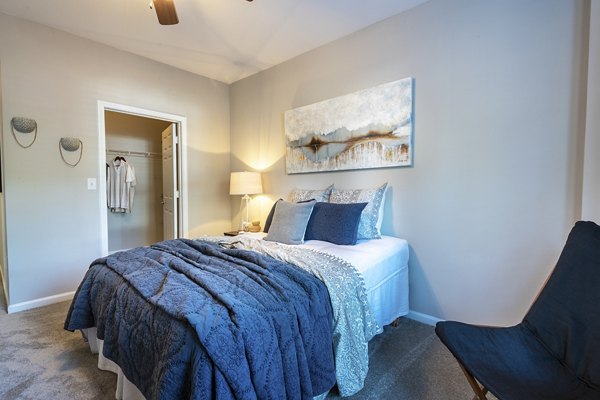 Bedroom featuring elegant design and cozy furnishings in Wakefield Glen Apartments