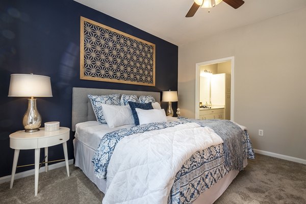 Cozy bedroom with modern decor at Wakefield Glen Apartments