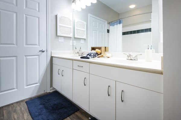 Bathroom featuring modern fixtures and stylish tile at Wakefield Glen Apartments, a luxury living community