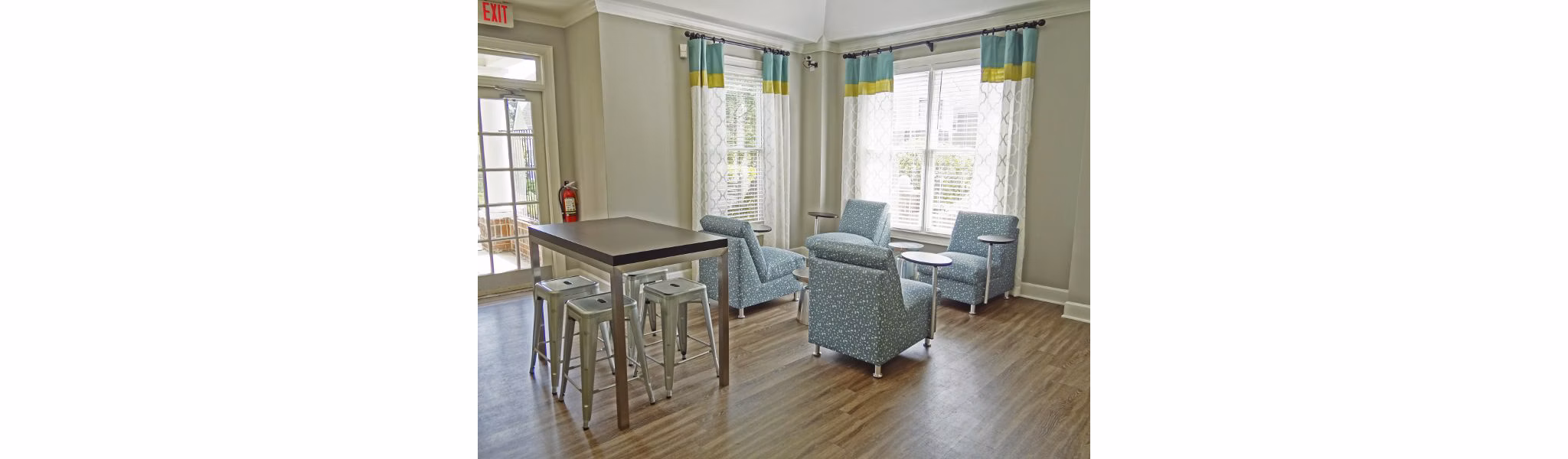 Elegant clubhouse at Wakefield Glen Apartments with comfortable seating areas and entertainment facilities