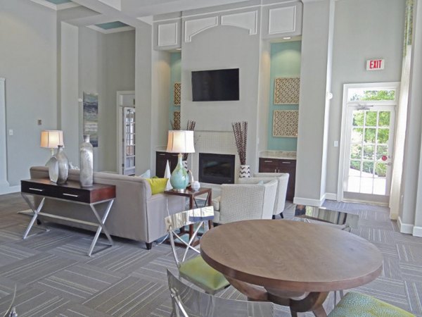 Clubhouse featuring a modern lounge and community space at Wakefield Glen Apartments