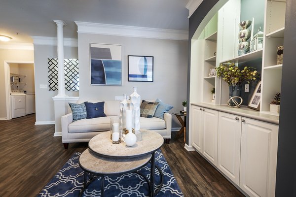 Inviting living room with modern decor and natural light at Wakefield Glen Apartments