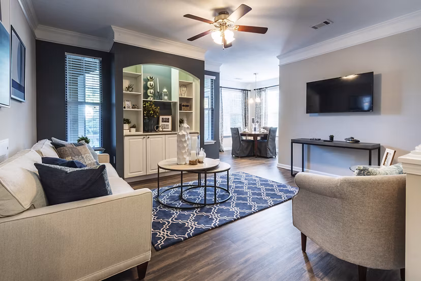 Modern living room with plush seating at Wakefield Glen Apartments, perfect for relaxation and entertaining